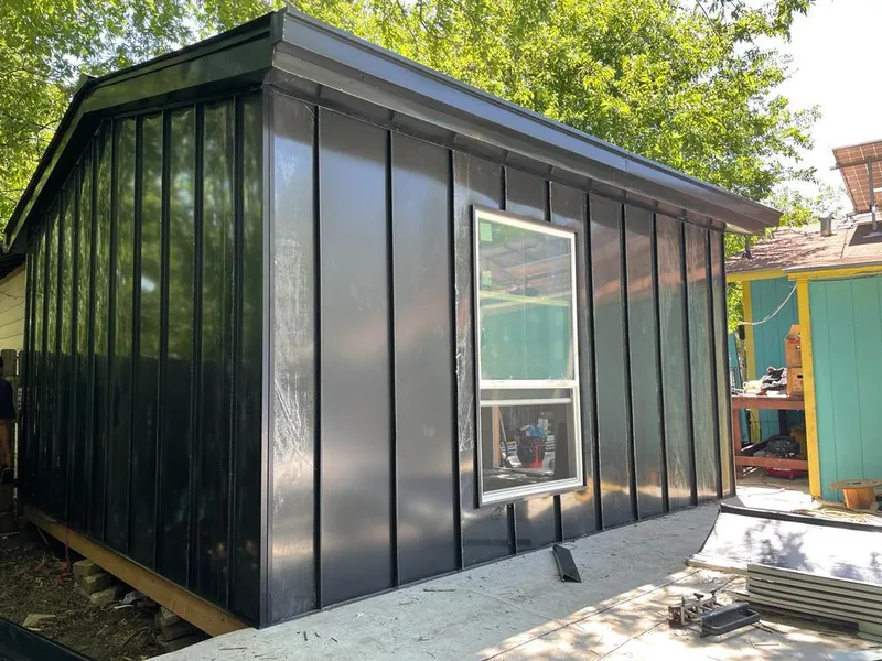 Black standing seam metal wall panels for Metal Roof Installation in Orange City